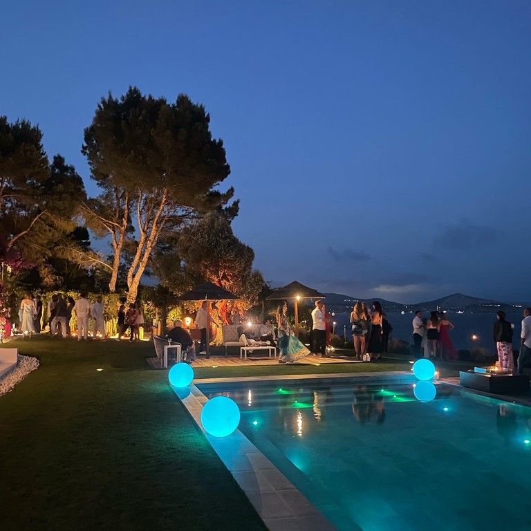 Evening private event beside a villa pool in Ibiza